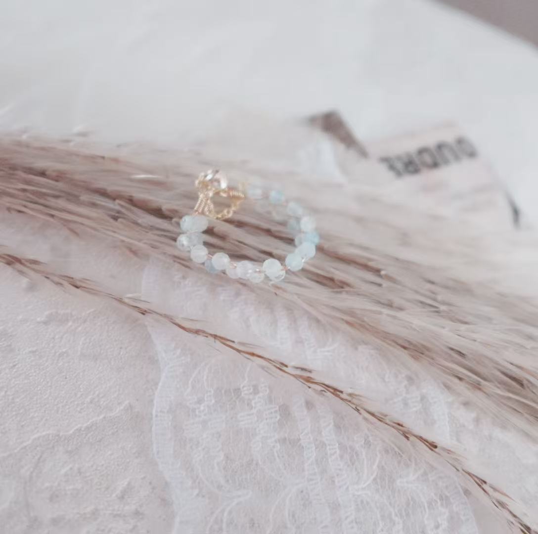 Aquamarine Faceted Bead Ring delicately designed with natural crystals for a stylish accessory