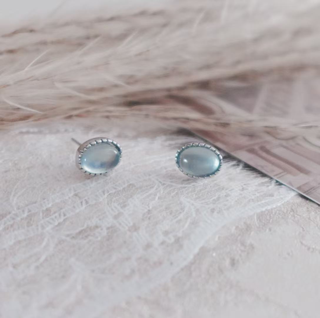 Elegant Aquamarine Oval Stud Earrings set in silver for a chic and timeless look