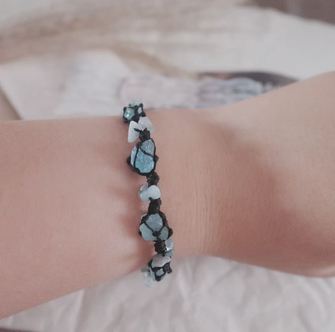 Blue Apatite Woven Bracelet featuring natural crystal beads on a black cord for a stylish look