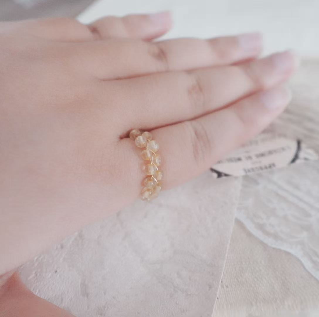 Citrine Bead Ring showcased on a hand, highlighting its natural crystal beauty and vibrant color