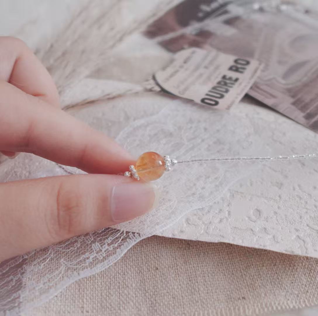 Handcrafted Citrine Beaded Necklace featuring a luminous orange crystal and silver accents