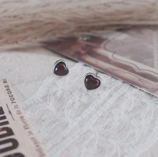 Garnet Heart Stud Earrings with a unique design, perfect for adding elegance to any outfit