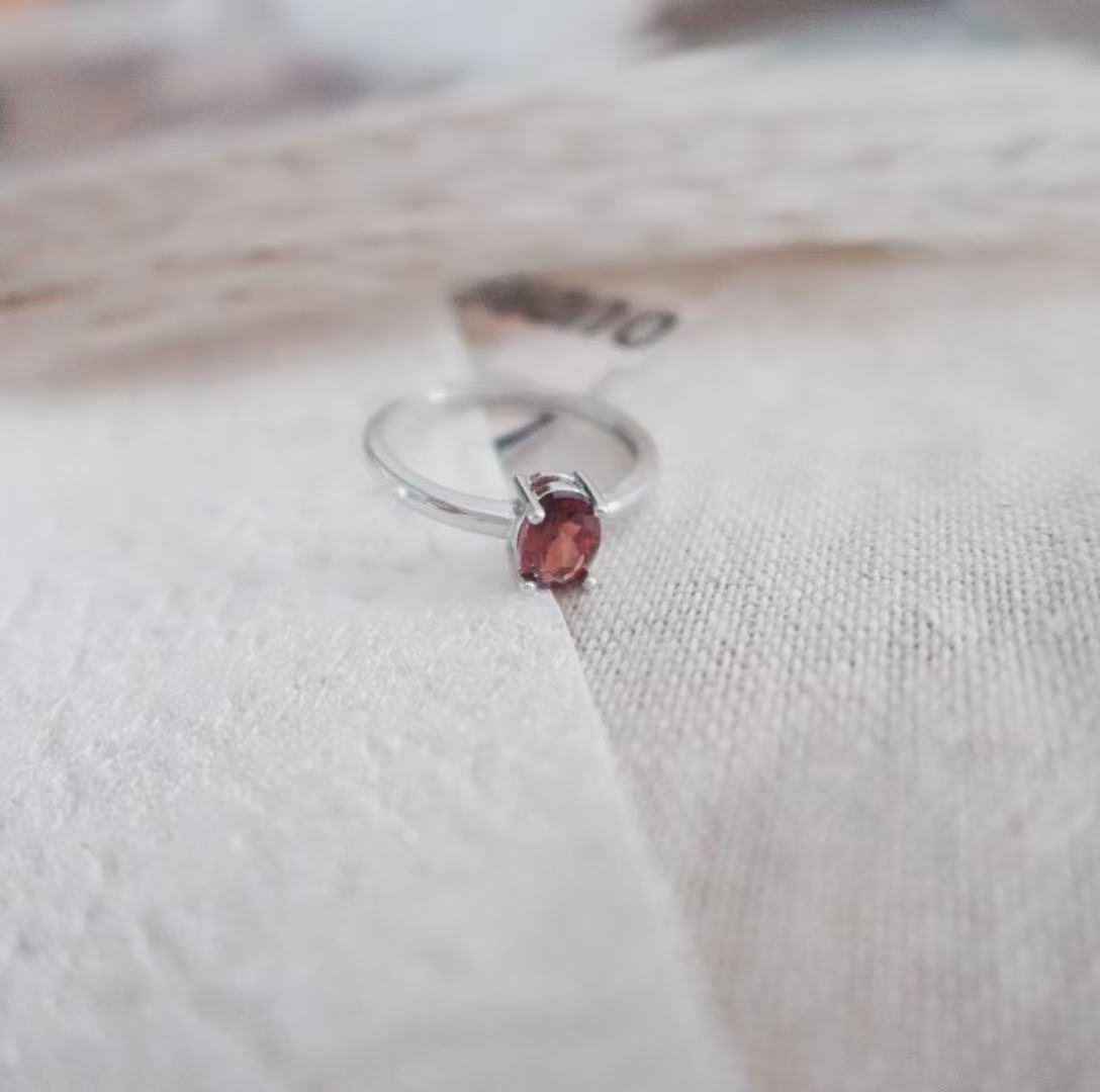 Elegant Oval Garnet Ring in silver setting, perfect for any special occasion or daily wear