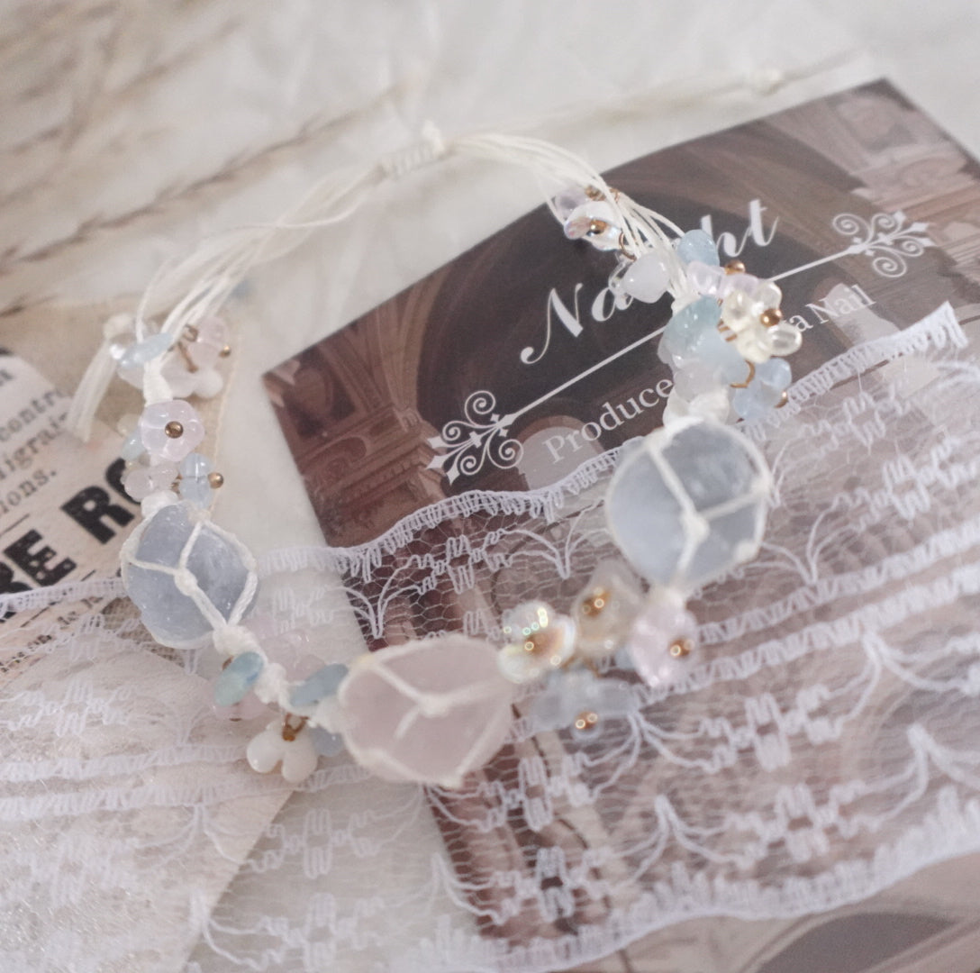 Handcrafted Rose Quartz & Blue Crystal Woven Bracelet with delicate embellishments and soft colors