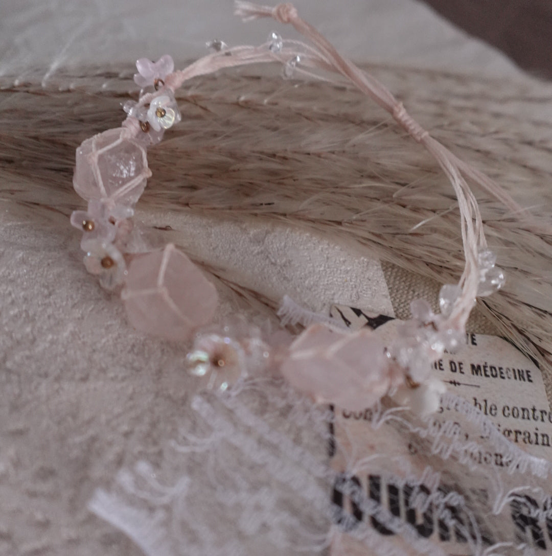 Handcrafted Rose Quartz Woven Bracelet with delicate floral accents and crystal beads