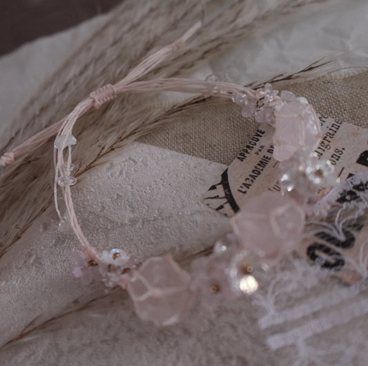 Rose Quartz Woven Bracelet with delicate pink crystal beads and intricate woven design