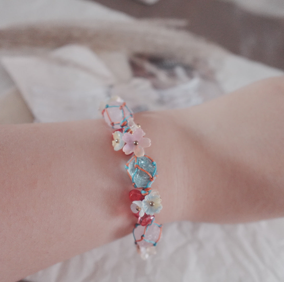 White Crystal & Blue Crystal Woven Bracelet with Floral Accents for Elegant Style