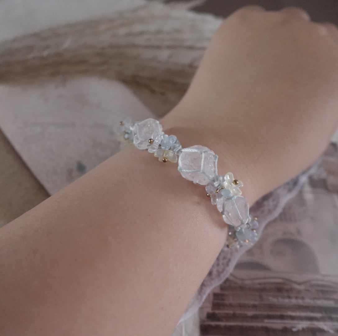 Delicate White Crystal Woven Bracelet featuring unique crystal beads and elegant design on wrist