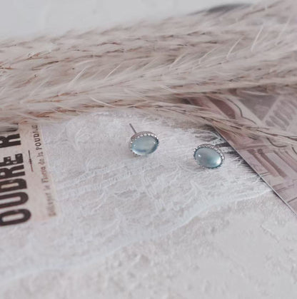 Elegant Aquamarine Oval Stud Earrings with Silver Accents for a Sophisticated Look